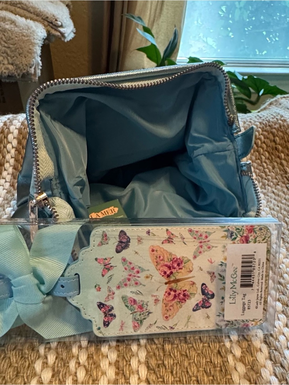 Light Blue Cosmetic Pouch with Butterfly Luggage Tag